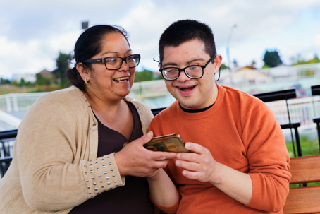 mother and son with special needs laughing