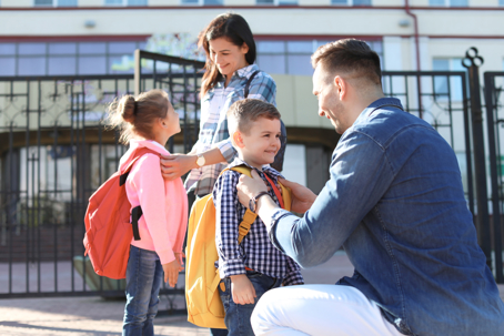 Parents helping their children prepare for school while navigating a shared parenting plan in Ohio